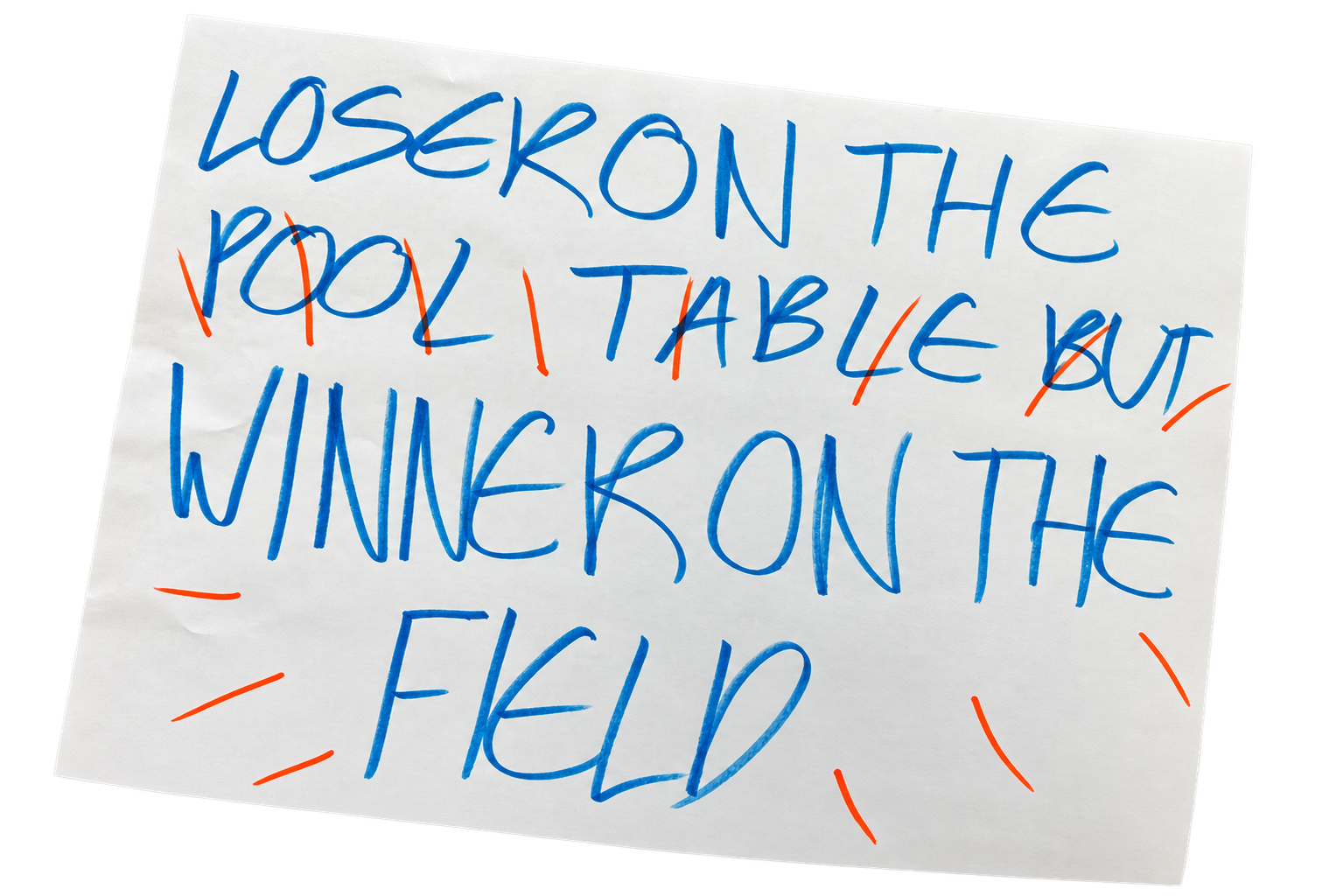 Handwritten sign that says loser on the pool table but winner on the field